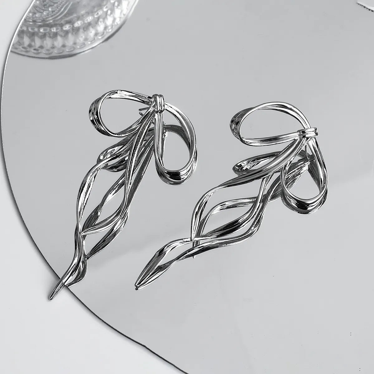 Sash Sweetheart Silver Bow Earrings